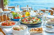 © EnricaDjango - Mediterranean vegetable dishes, Greek salad, seafood dishes, fruit salad, glasses of water, napkins, olive oil, beautiful setting, light turquoise sea and sky
