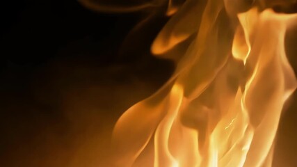 Wall Mural - golden flames dance and swirl, creating a stunning display of light and heat in the darkness. vibran