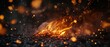 © Peerarut - Capture a dynamic flickering fire with intense, glowing embers and lively flames, set against a dark backdrop for a vivid and dramatic effect