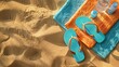 © chutikan - Close-up of flip flops and towel lying on the sandy beach, quiet and relaxing.