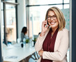 © peopleimages.com - Business, phone call and portrait of woman in office for company, planning and communication. Real estate agent, happy and face with tech at work for property sale, negotiation and update to client