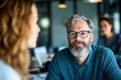 © DigitalMagicVisions - Professional Adviser Consulting with Nonprofit Director on Bright Office Budget Planning, Medium Shot