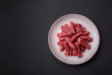 Wall Mural - Juicy fresh raw beef meat with salt, spices and herbs