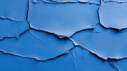 Poster - The surface reveals a vibrant blue paint that has cracked and peeled, displaying various textures and imperfections under soft natural light