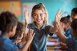 © kenkuza - Teachers and students give high fives at school
