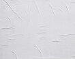 © MRK STUDIO - Blank white crumpled and creased paper poster texture background