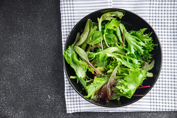 Wall Mural - salad green leaves mix salad fresh meal food snack on the table copy space food background rustic top view keto or paleo diet vegetarian vegan food