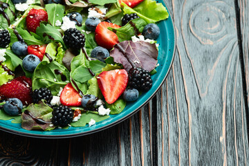 Canvas Print - Berries salad (blueberry strawberry blackberry ) with cheese feta and balsamic sauce