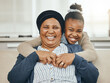 © Flashizzle/peopleimages.com - Home, grandmother and girl with smile, hug and love with embrace, bonding together and happiness. Black family, apartment and senior woman with grandchild, portrait and funny with joy and cheerful