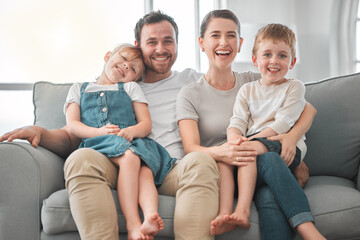 Poster - Couch, parents and children in portrait for love, connection and bonding together in family home. House, mother and father with siblings for security, care and embrace relationship with smile in sofa