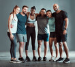 © peopleimages.com - Group, portrait and smile for workout, gym training and exercise class or healthcare for bonding and wellness. People, diversity and motivation for sports, teamwork or support for collaboration