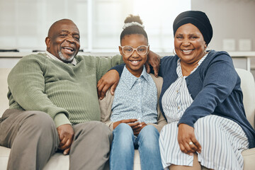 Canvas Print - African, portrait and smile with family on sofa in living room of home together for bonding. Happy, love or visit with grandpa, granny and girl child in apartment for development, growth or wellness