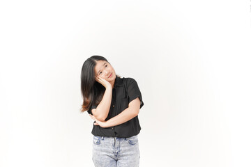 Wall Mural - Young Asian woman doing thinking gesture wearing Black t-shirt and jeans isolated on white background