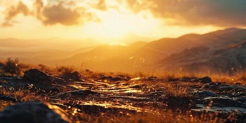 Poster - A beautiful mountain landscape with a sun setting in the background
