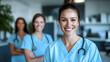 © Siasart Stock - A group of smiling healthcare professionals in scrubs.