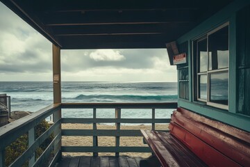 Vintage lifeguard station in Laguna Beach famous in California with Pacific Ocean in the background on a cloudy day