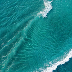 Aerial view beautiful of sea waves from drone. Stock image of blue color of ocean water, sea surface, sunset. Top view on turquoise waves, clear water surface texture.