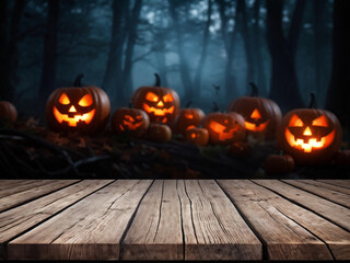 wooden table and blurred empty halloween night background. tombs. bats. pumpkins. blank of halloween