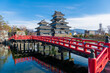 © Danita Delimont - The Matsumoto Castle as seen from the bridge with the city buildings in the background, Japan