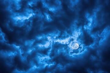 Wall Mural - Full moon through clouds