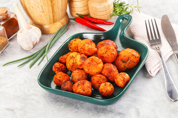 Canvas Print - Baked young potato with paprika