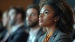 © The Little Hut - Multiracial group of business people listening to a speaker during an education event at convention center : Generative AI