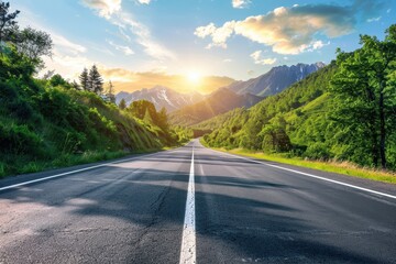 Wall Mural - Road with clouds at sunset amidst mountains