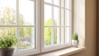 © praewpailyn - A bright and airy window scene with a potted plant, showcasing nature and sunlight in a cozy interior setting.