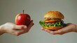 © itykhonova - One hand holding apple fruit, other holding hamburger. Healthy natural organic fresh vegetarian food vs unhealthy processed fast junk food meat. Nutrition diet lifestyle, fitness eating choice