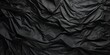 © Stefan - Crumpled black paper texture abstract background with copy space for text
