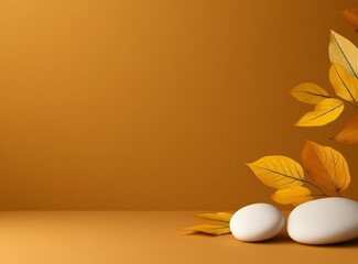 two white rocks and yellow leaves on a beige background