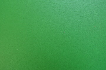 Close view of bright may green painted wall