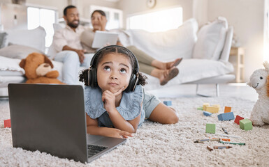 Canvas Print - Child, thinking and laptop with headphones for online, hobby or entertainment in home for e learning. Young person, kid and technology for youth development, growth or creativity as student in lounge