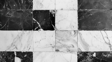 Poster - The black and white marble tiles display a striking geometric pattern that enhances any interior space