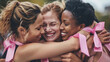 © Creative Valley - Women Hugging with Intertwined Pink Ribbons, Breast Cancer Awareness
