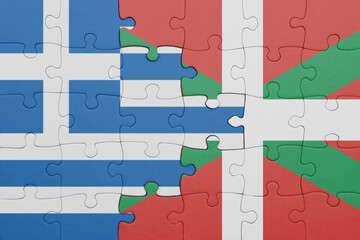 puzzle with the colourful national flag of basque country and flag of greece.