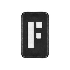 Leather classic black tag with Latin letter F isolated