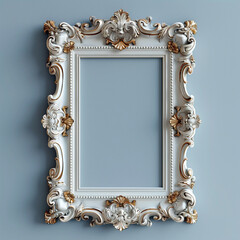 A white frame with gold trim sits on a blue wall