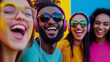 © Maksym - A group of friends from different cultural backgrounds, all wearing headphones and smiling brightly, with a vibrant, color-filled background that symbolizes the joy of music and un