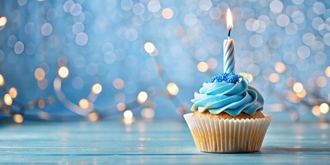 Birthday cupcake with lit candle, surrounded by blue decorations and background, birthday, cupcake, candle, blue, celebration