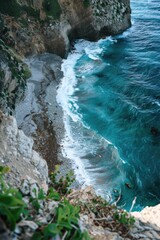 Poster - A breathtaking view of the ocean from the top of a cliff, perfect for use in travel or adventure photography