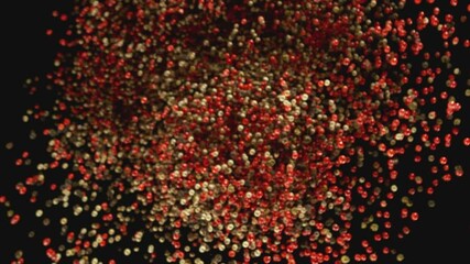 Poster - Super Slow Motion of Flying Dry Whole Peppers Balls on Black Background, Rotating. Filmed on High Speed Cinema Camera, 1000 fps.