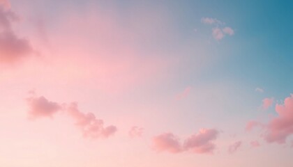 Poster - Soft pink and blue clouds in a clear sky.