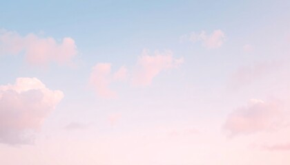 Poster - Soft pink and blue clouds in a pastel sky.