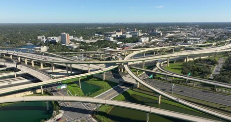 Poster - Massive highway intersection in American city area. Stacked elevated interchange lanes for express passing of car traffic. Tampa, Florida.