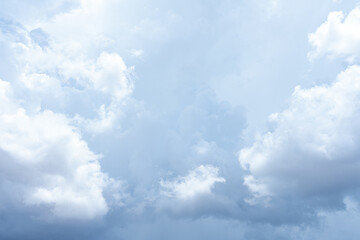 Bright blue sky with fluffy white clouds