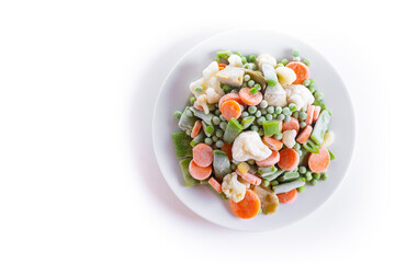 Sticker - Frozen vegetable stew on a plate isolated on white background