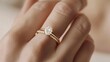 © nuryadin - Close-Up of Diamond Engagement Ring on Finger