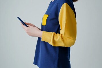Poster - yellow clothes hold a black screen, a blue case is highlighted on a white background with a mobile p