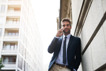 Poster - Smile, city and man with phone call as employee for networking, conversation and communication in New York. Male person, confident at against the wall on sidewalk for connection and discussion